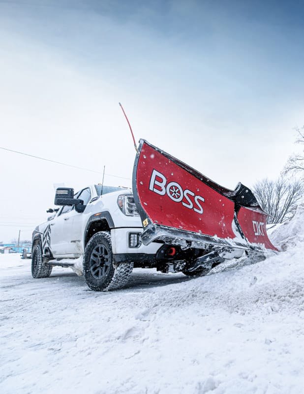 A Truck with a snow plow attachment