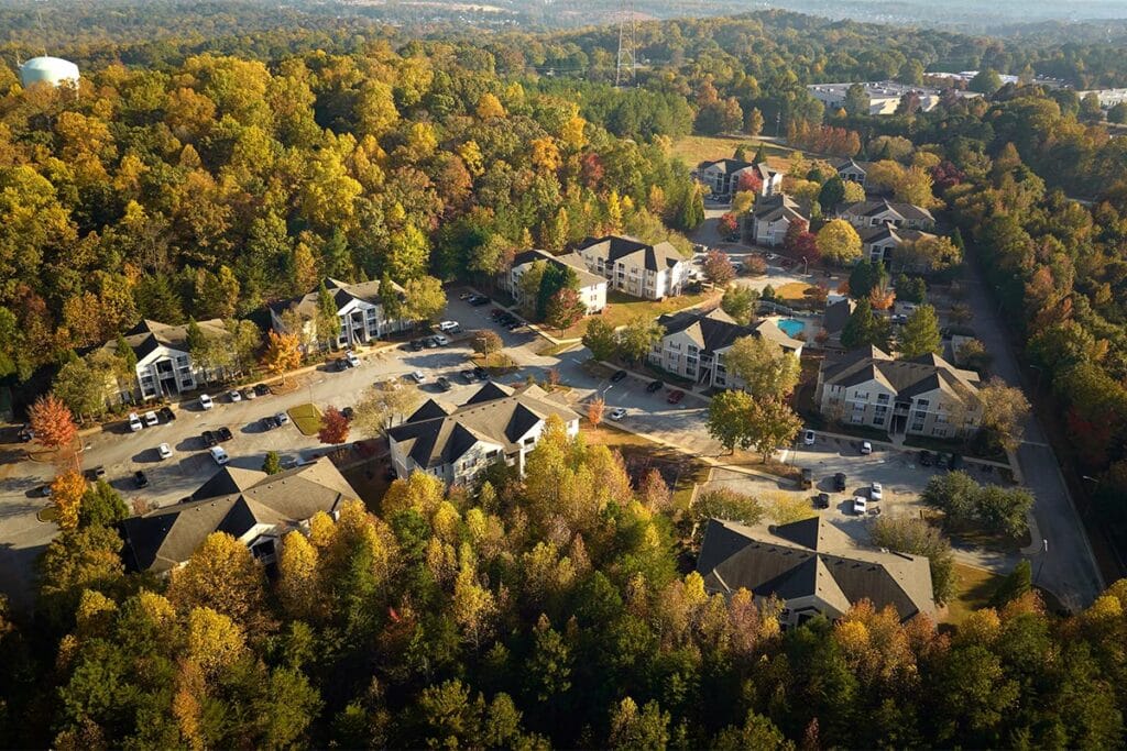 an aerial photo of homes in the fall